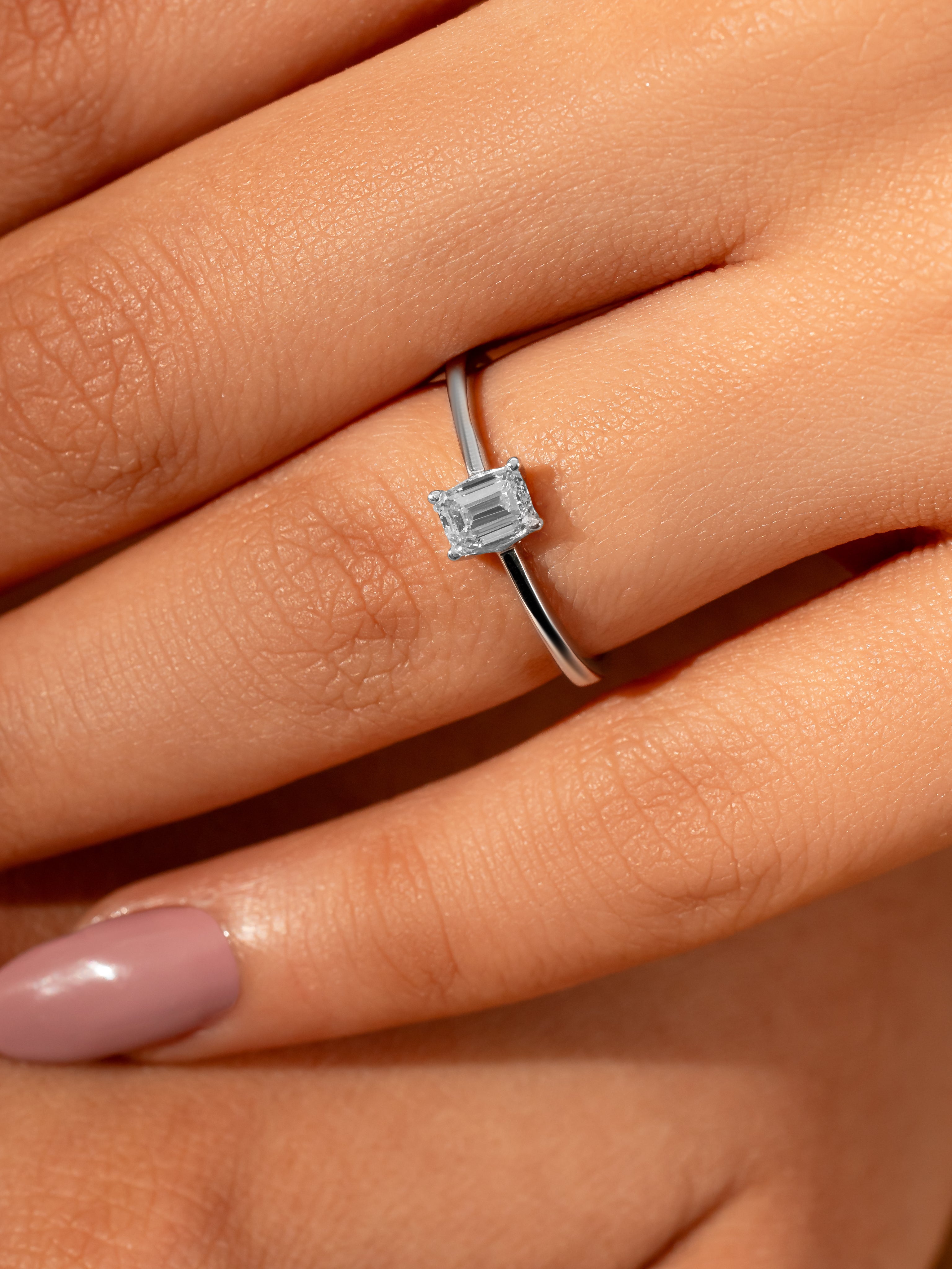 Classic emerald cut diamond ring